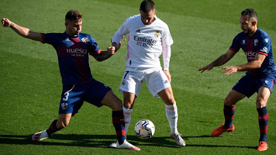 Hazard stunner gives revived Real Madrid win over Huesca - AFP-newsheadline247.com
