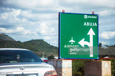 Just In: #BuhariMustGo protesters occupy Abuja airport road- newsheadline247.com