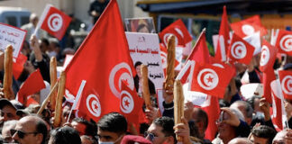 Thousands of Tunisians rally against president on 2011 revolution anniversary