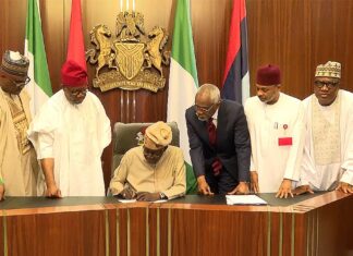 Tinubu Signs Electoral Act 2026 into Law, Manual Transmission Survives as Real-Time Electronic Debate Closes